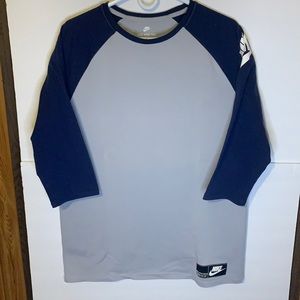 Nike 3/4 sleeve shirt. Size Large. Like new condition. Very unique!